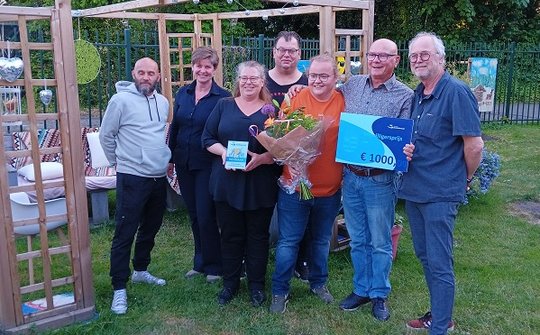 Foto van de winnaars samen met wethouder Sterenborg