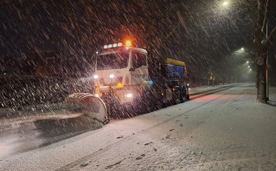 Sneeuwschuiver in actie foto
